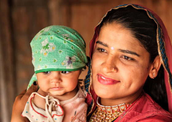 Indian woman with her newborn daughter, Bishnoi village